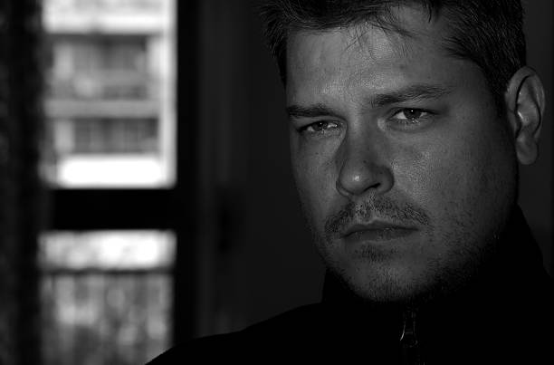 istock Portrait of young man monochrome 626174444