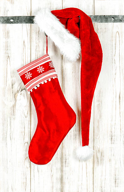istock Christmas stocking Decoration red ornaments wooden background 626177018