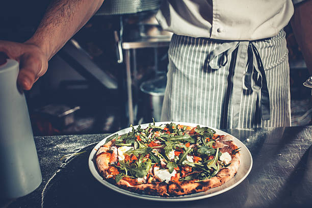 istock Chef cooking gourmet pizza 626177046