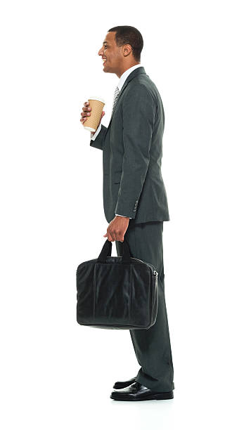 istock Smiling businessman holding coffee cup 626177520