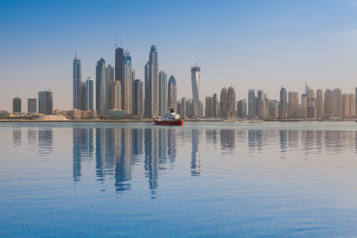 View from swimming pool on Dubai Marina in a summer day, United Arab Emirates
