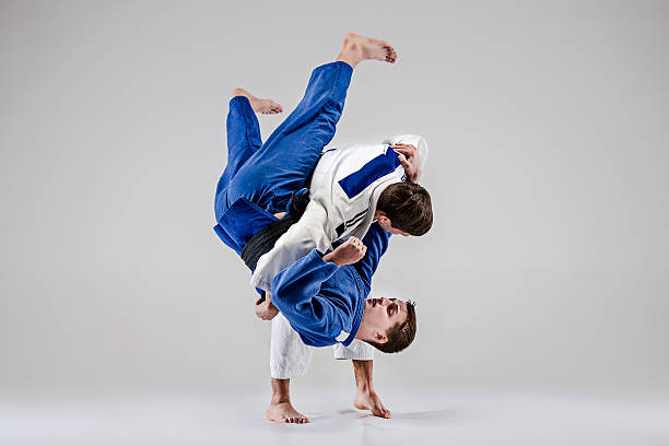 istock Two judokas fighters fighting men 626185218