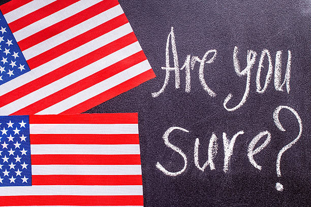 istock Are you sure  on the chalk board and US flag 626186170