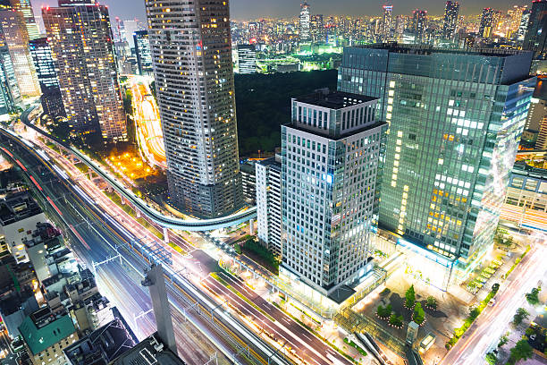 istock modern buildings in tokyo at night 626186252