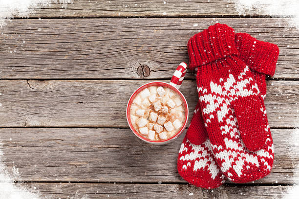 istock Christmas background with mittens, hot chocolate 626187338