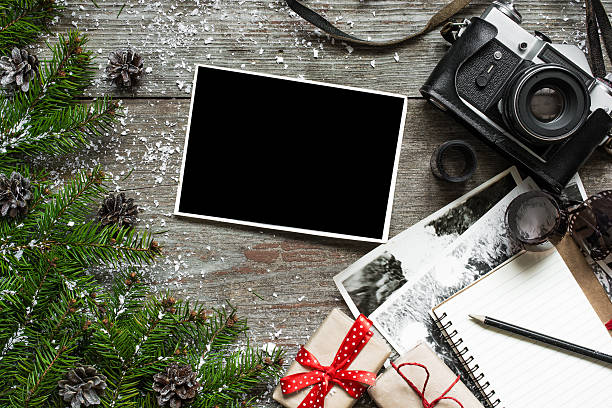 istock retro christmas background with vintage camera and blank photo 626188580