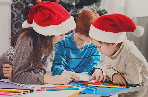 istock Children writing letter to santa, wait for christmas 626194500
