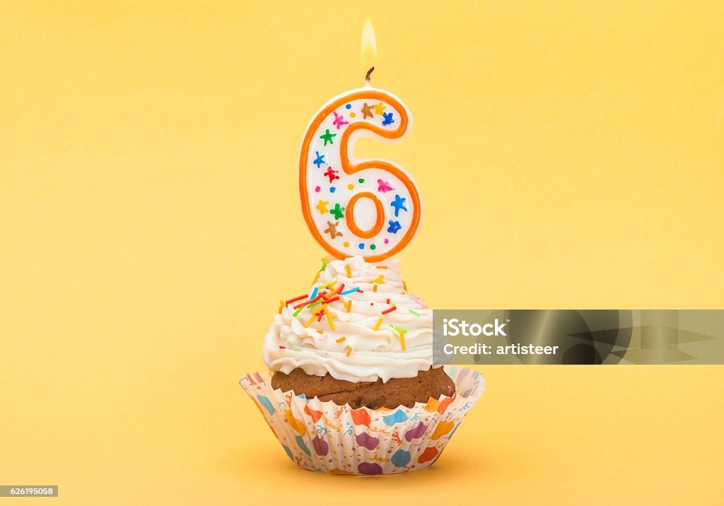 Birthday Birthday Cupcake with Number Six Candle 6-7 Years Stock Photo