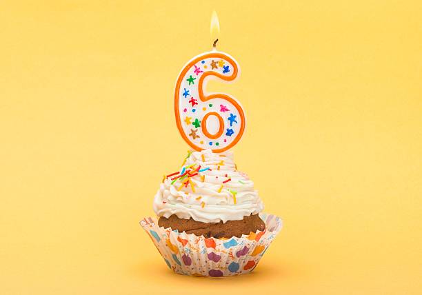 Birthday Birthday Cupcake with Number Six Candle 6 7 years stock pictures, royalty-free photos & images