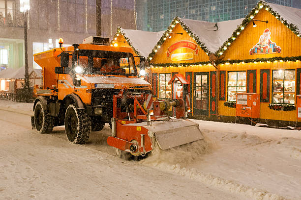 Christmas decorations and snowploug in Berlin stock photo