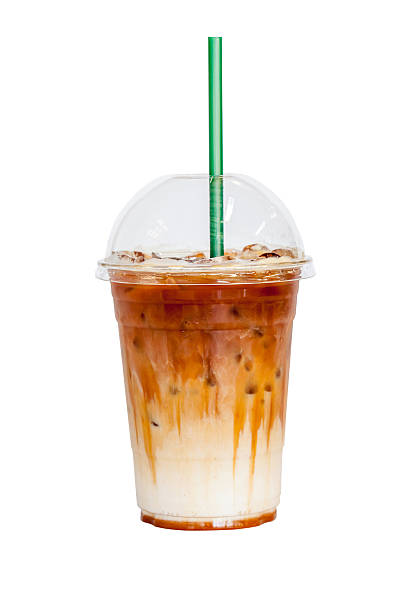 istock Iced latte coffee topped with fresh milk layer white background. 626197362