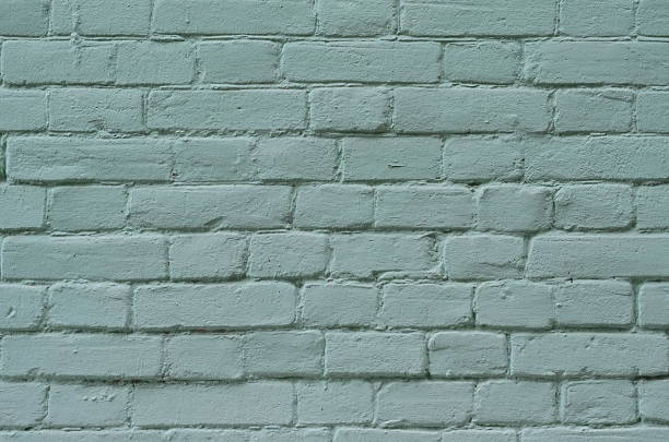 istock Texture of old blue brick wall surface with cement 626204966