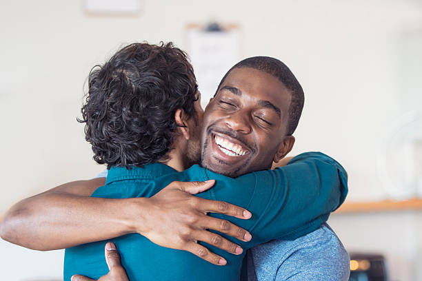 istock Multi-ethnic gay couple embracing 626207926