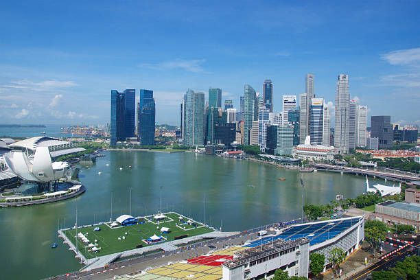 istock SINGAPORE - JULY 23rd, 2016: Skyscraper of downtown reflect in 626213520