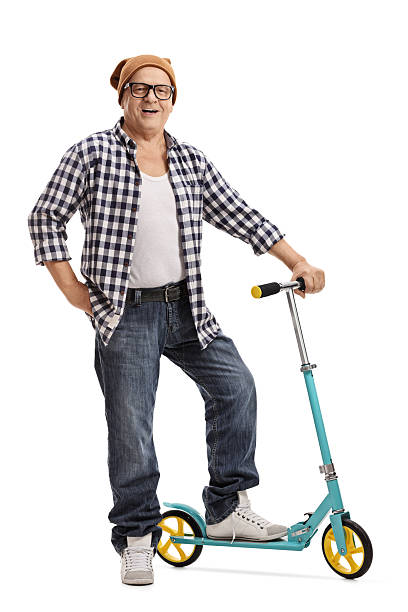 istock Mature hipster posing with a scooter 626216772