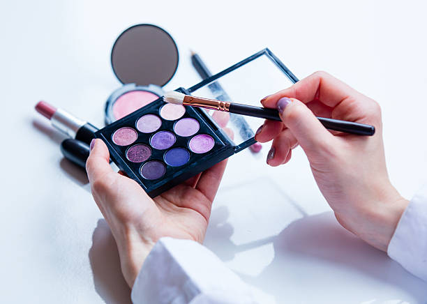 istock female hands and cosmetics 626216796