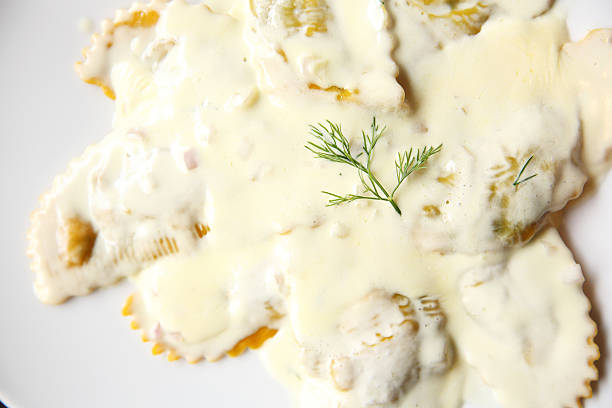 istock ravioli on wood background 626218516