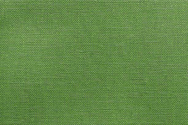 istock textured background rough fabric of green lime color 626224288