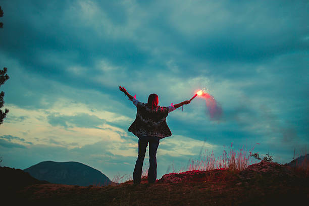 istock Girl with flaming torch 626230088