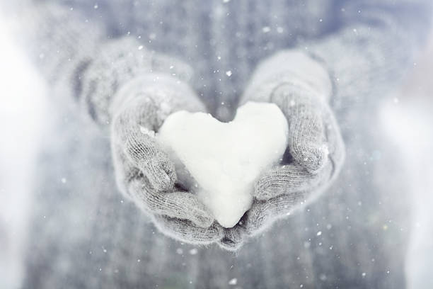 snowy heart stock photo