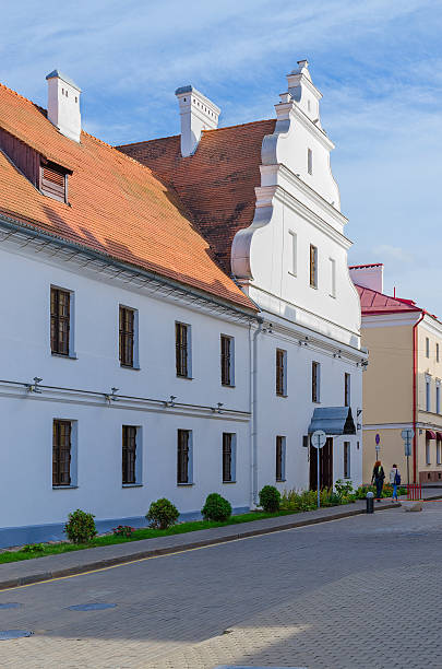 Former basilian convent, Engels Street 1, Minsk, Belarus Minsk, Belarus - October 1, 2016: Unidentified people go on Engels Street near building of former basilian convent (now building is children's music school number10 named Glebov) friedrich engels stock pictures, royalty-free photos & images