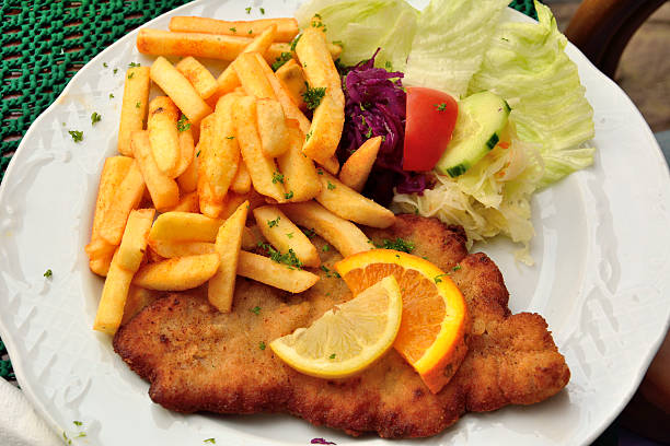 istock Schnitzel with french fries 626232300
