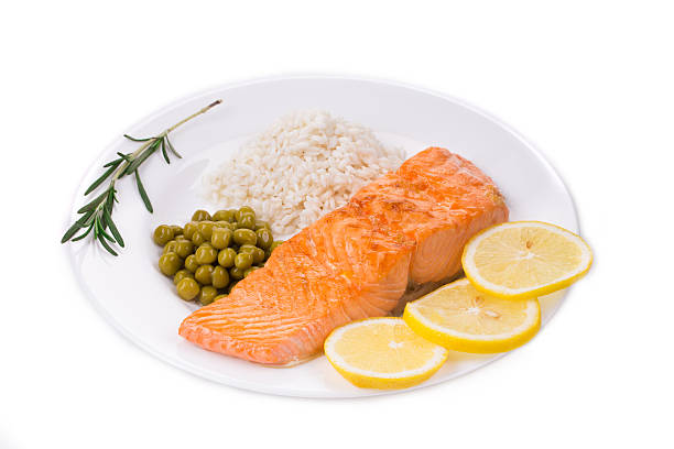 istock Grilled salmon steak with garnish. 626233252
