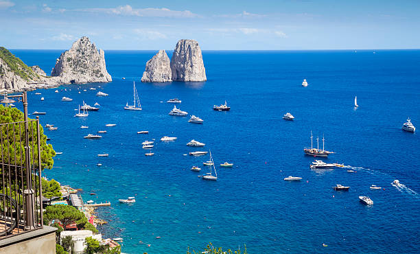 istock View on Faraglioni rocks from Capri island, Italy 626241206