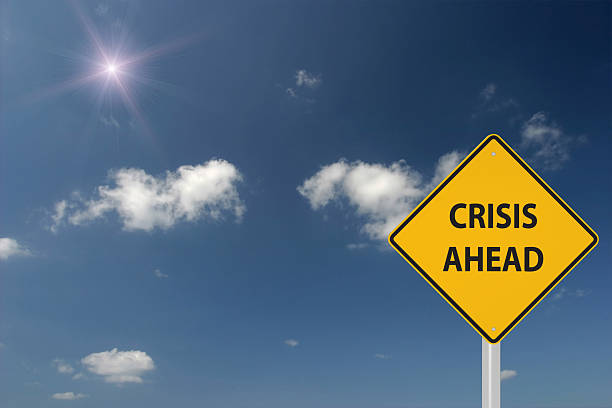 istock Crisis ahead warning sign concept 626241324