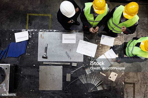 Workers And Manager At Factory Stock Photo - Download Image Now - Manufacturing, Factory, Occupational Safety And Health