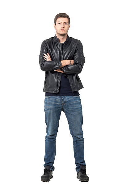 istock Young casual man with crossed arms looking at camera 626248236