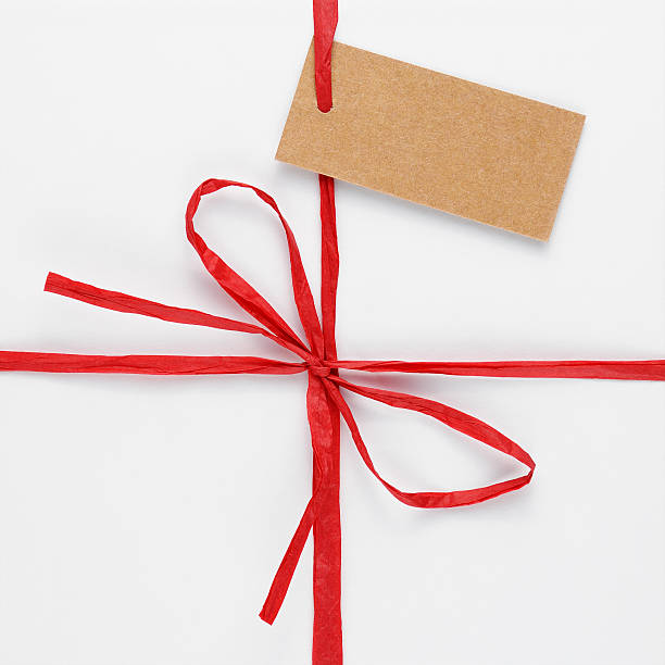 istock Top of white gift box with tag 626254942
