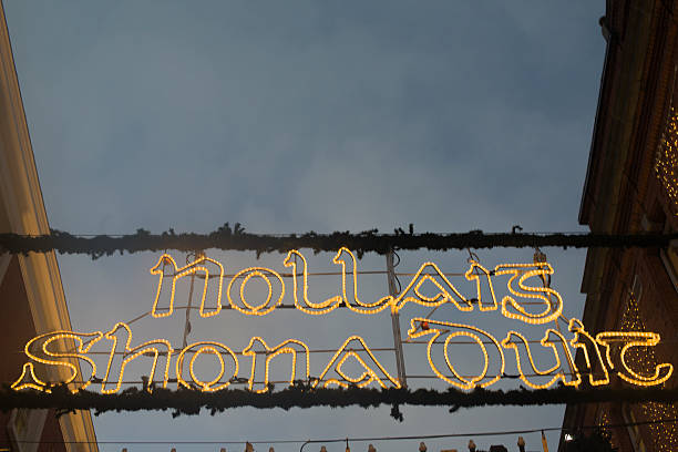 Nollaig Shona duit which translates to Merry Christmas to you, in lighting at night, Dublin, Ireland. 