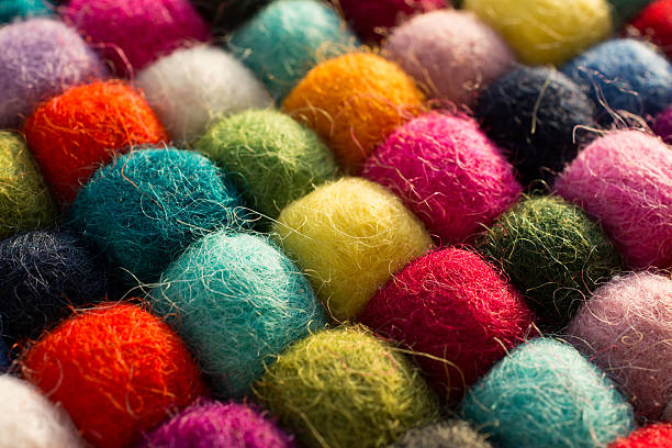 istock Geometric background with balls of colored synthetic wool 626258198