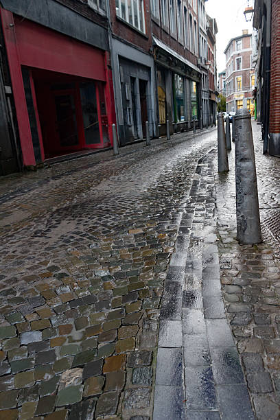 istock Ancient, narrow street Liege 626258308