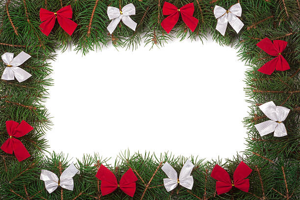 istock Christmas frame made of fir branches decorated with bows isolated 626259000