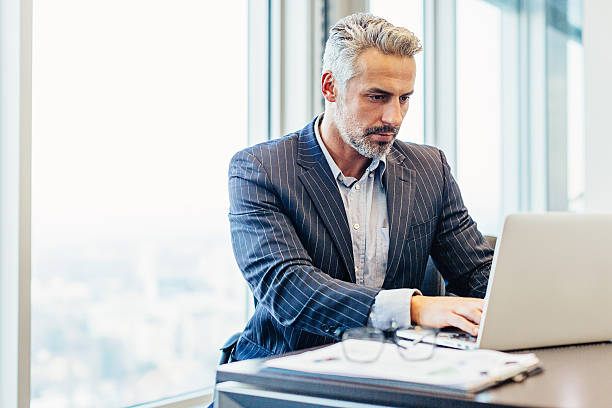 istock Middle age businessman in the office 626260070