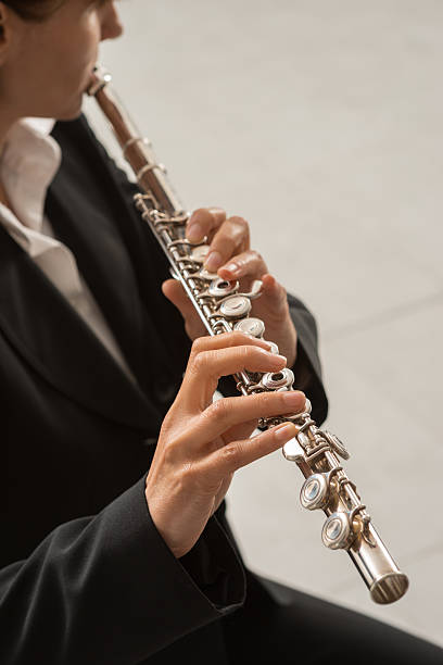 istock Woman playing transverse flute 626260930