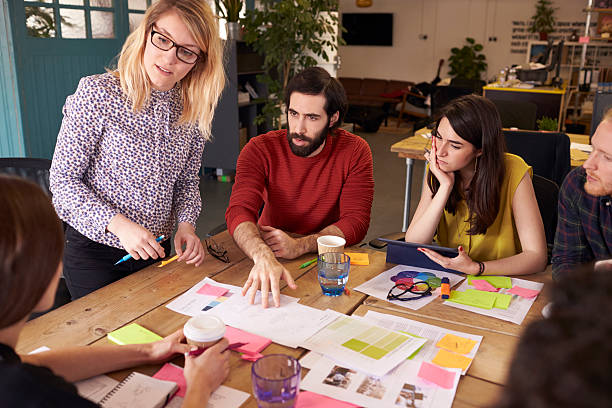 istock Female Manager Leads Brainstorming Meeting In Design Office 626261526