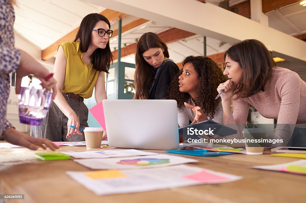 Female Designers Having Brainstorming Meeting In Office Businesswoman Stock Photo