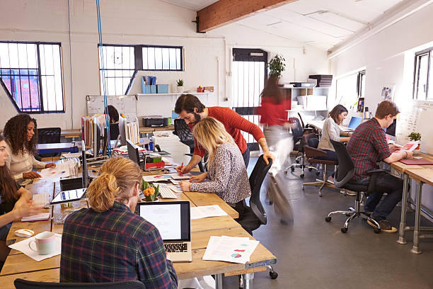 istock Interior Of Busy Design Office With Staff 626262088