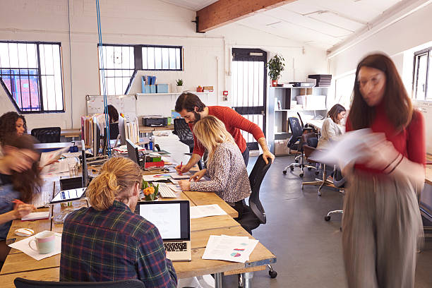 istock Interior Of Busy Design Office With Staff 626262104