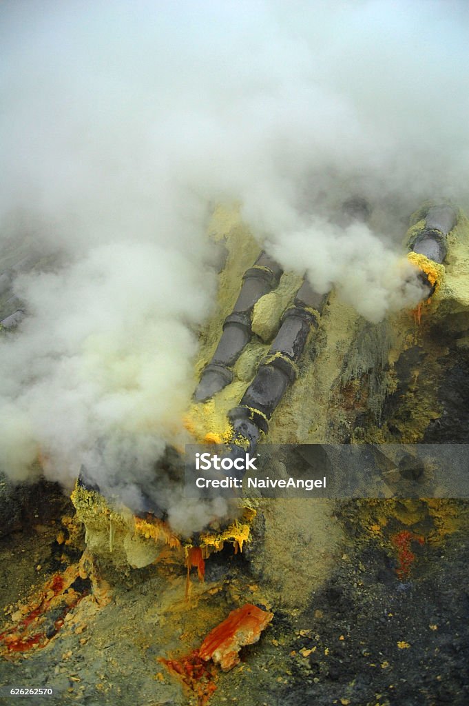 Sulfur mining at the crater of active volcano Ijen, Indonesia Sulfur mining at the crater of active volcano Ijen Activity Stock Photo