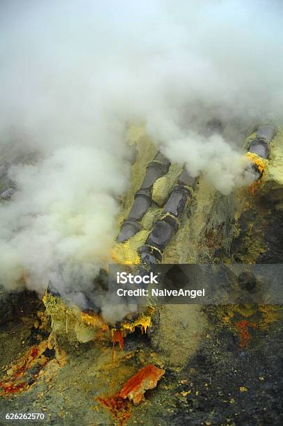 Sulfur Mining At The Crater Of Active Volcano Ijen Indonesia Stock Photo - Download Image Now