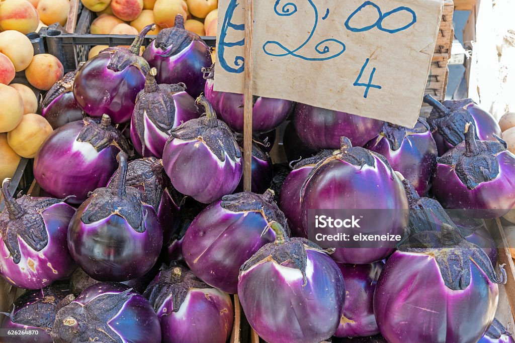 Fresh round eggplant at a market Fresh round eggplant for sale at a market in Palermo, Sicily Agriculture Stock Photo
