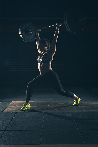 weightlifting strong woman on a gym