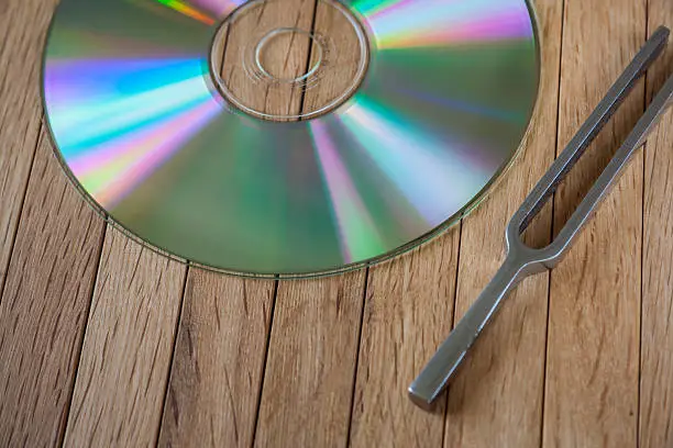 Photo of Compact Disc and Tuning Fork