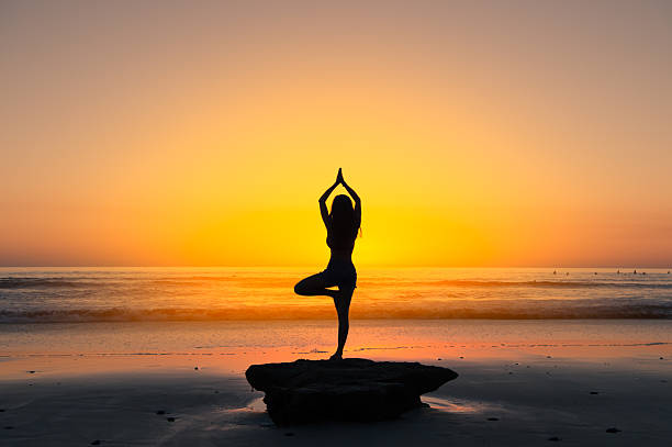 istock Women Sunset Yoga 626269094
