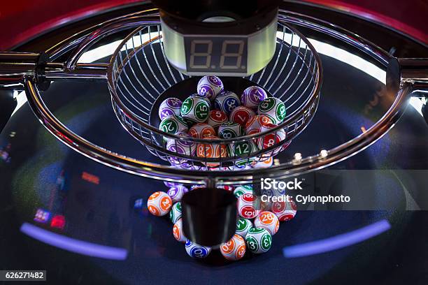 Colourful Lottery Balls In A Lotto Machine Stock Photo - Download Image Now - Number, Sports Ball, Bingo