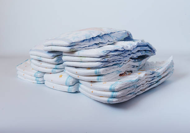 istock Stacks of diapers stacked in staggered rows 626289310